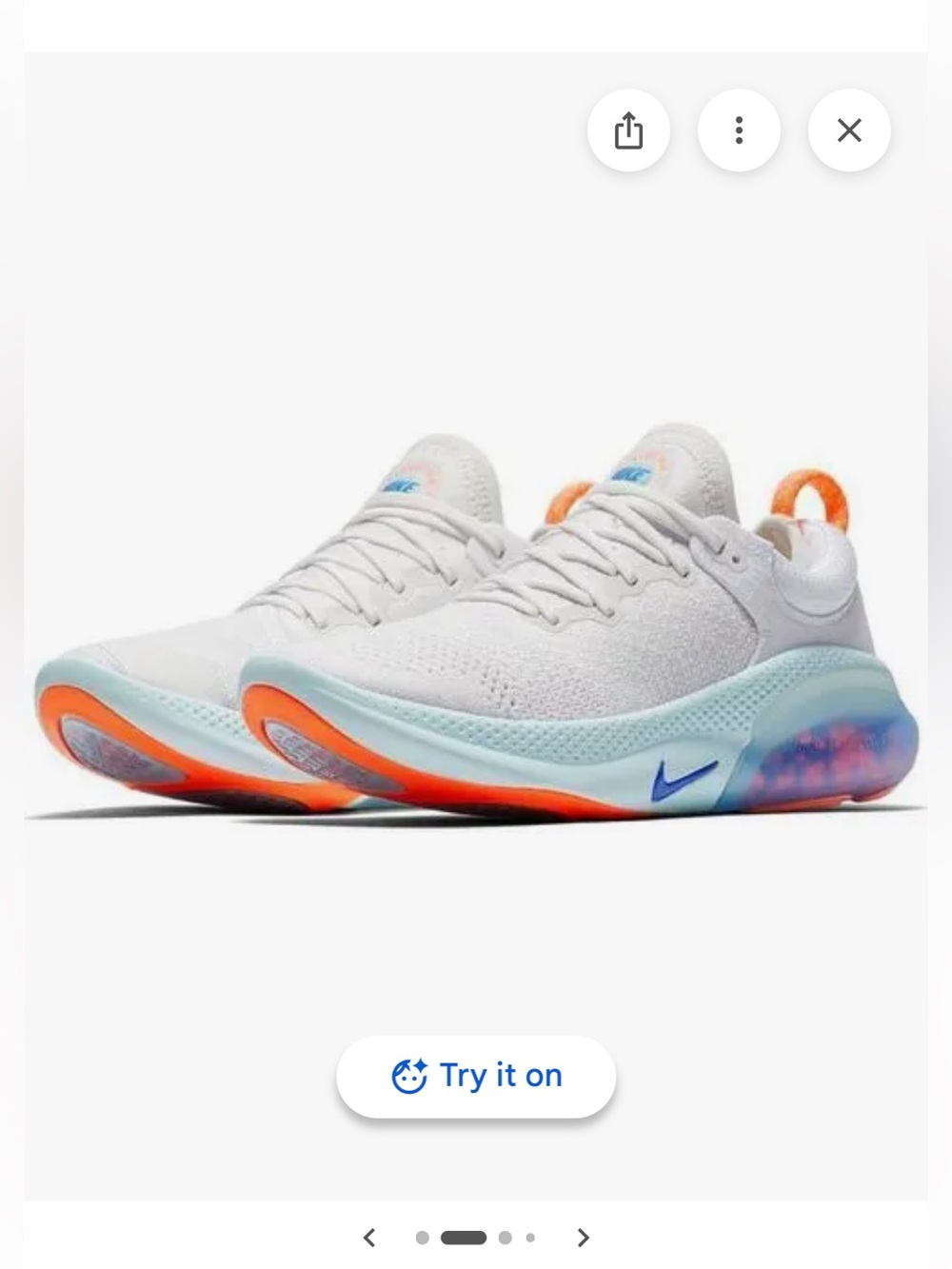 Nike Women’s White joyride Sneakers with Aqua and Coral Accents